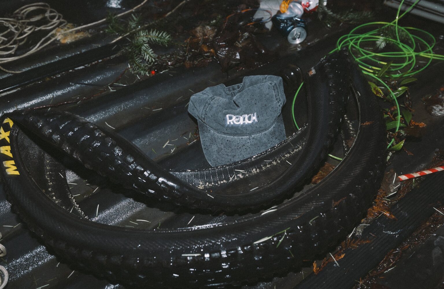 the roach classic hat sitting in the back of a truck.