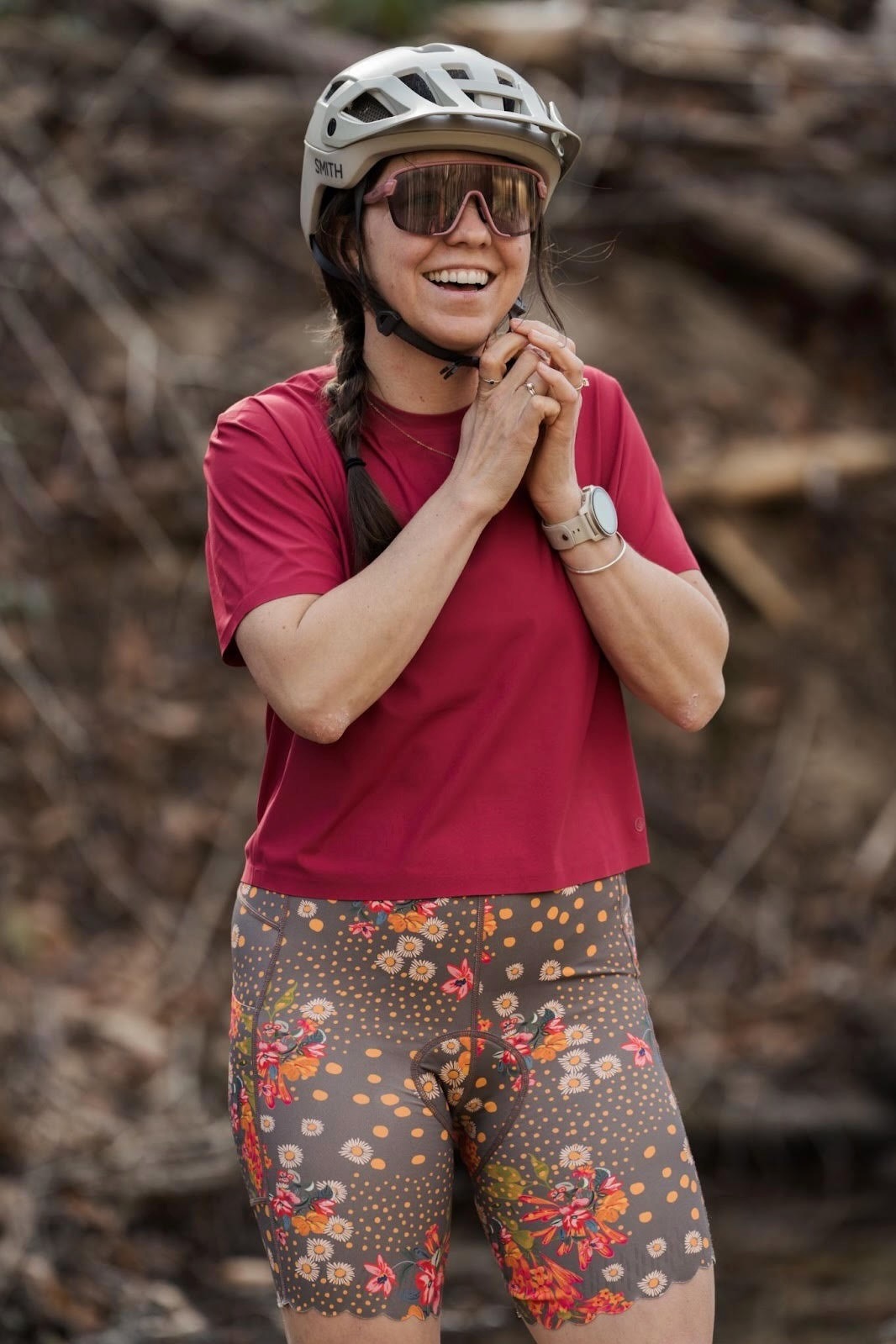 a female rider wearing Shredly gear, including the Bike Cham 2.0 in the Flora Clay color