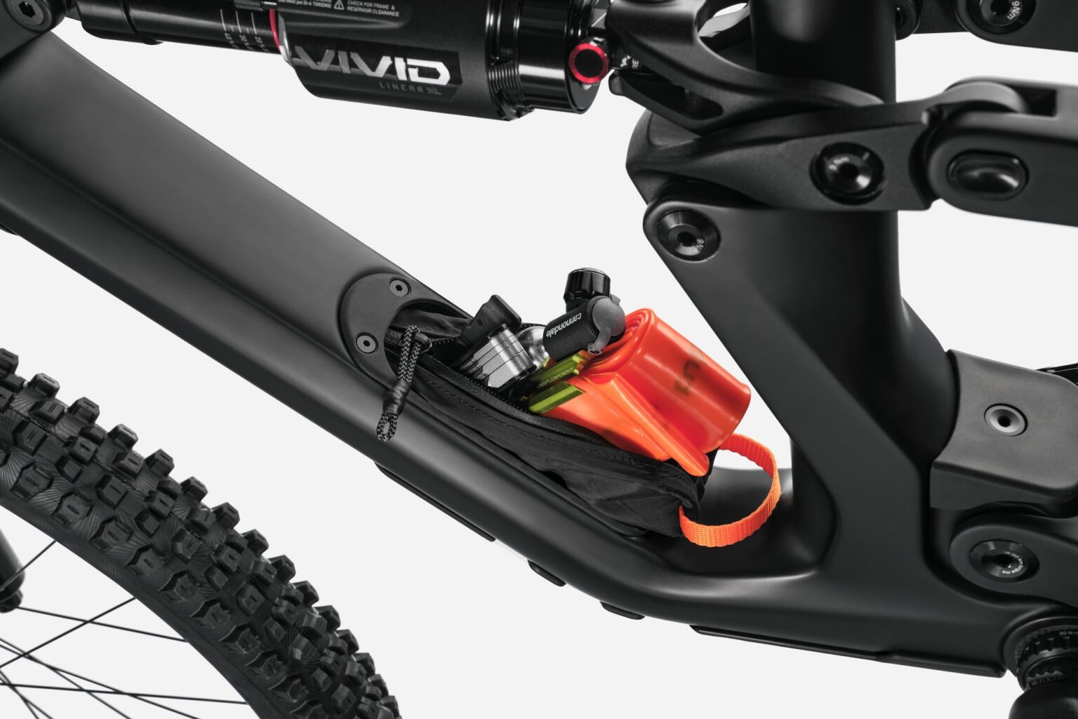 studio image of the Bad Habit storage compartment with a tool kit coming out of it.