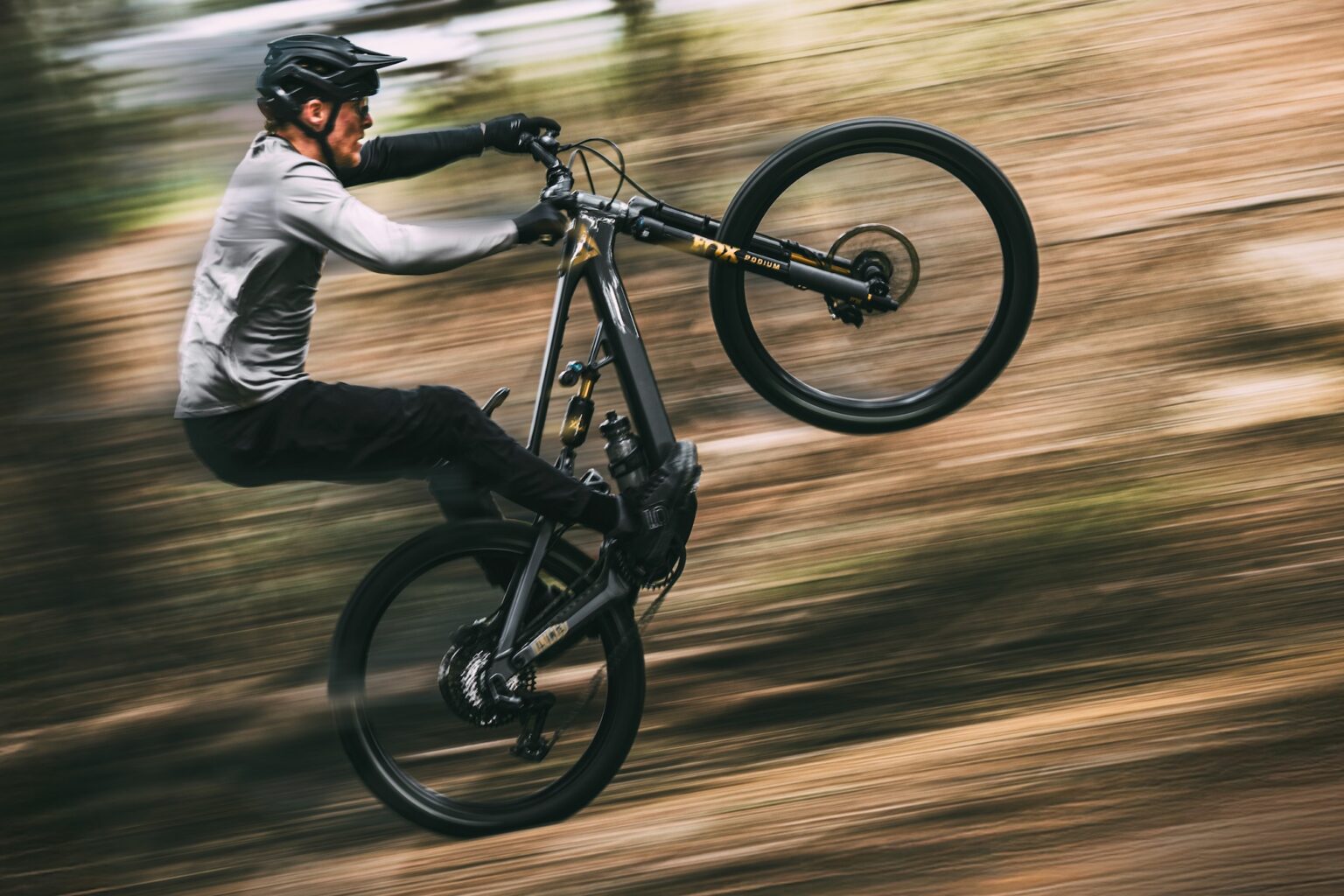 a guy riding a manual on the YT Decoy X