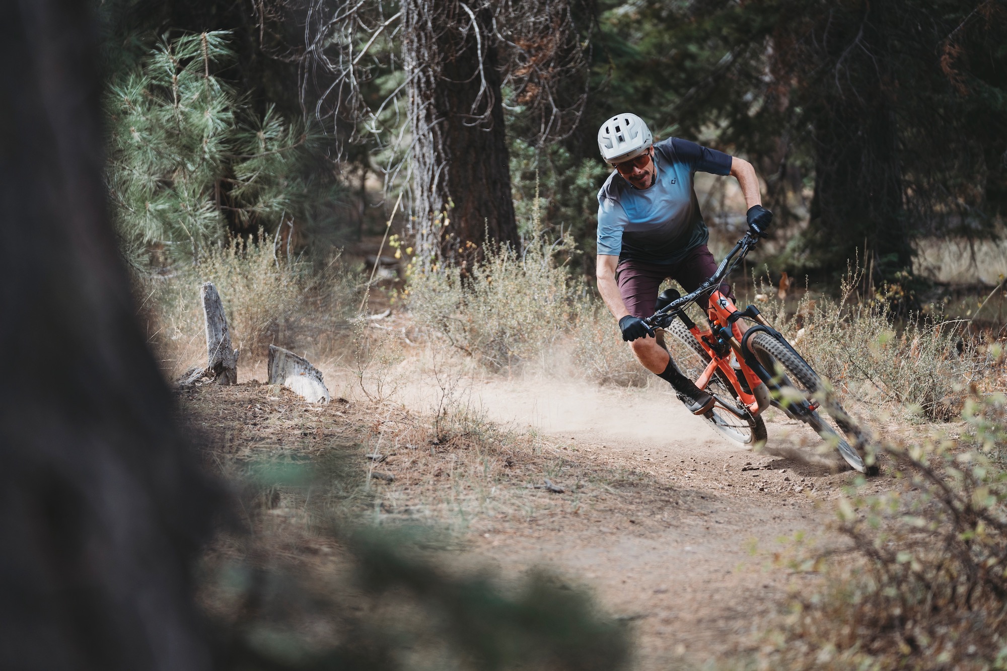 riding around a corner while testing the Sweet Protection Bushwhacker 2Vi MIPS.