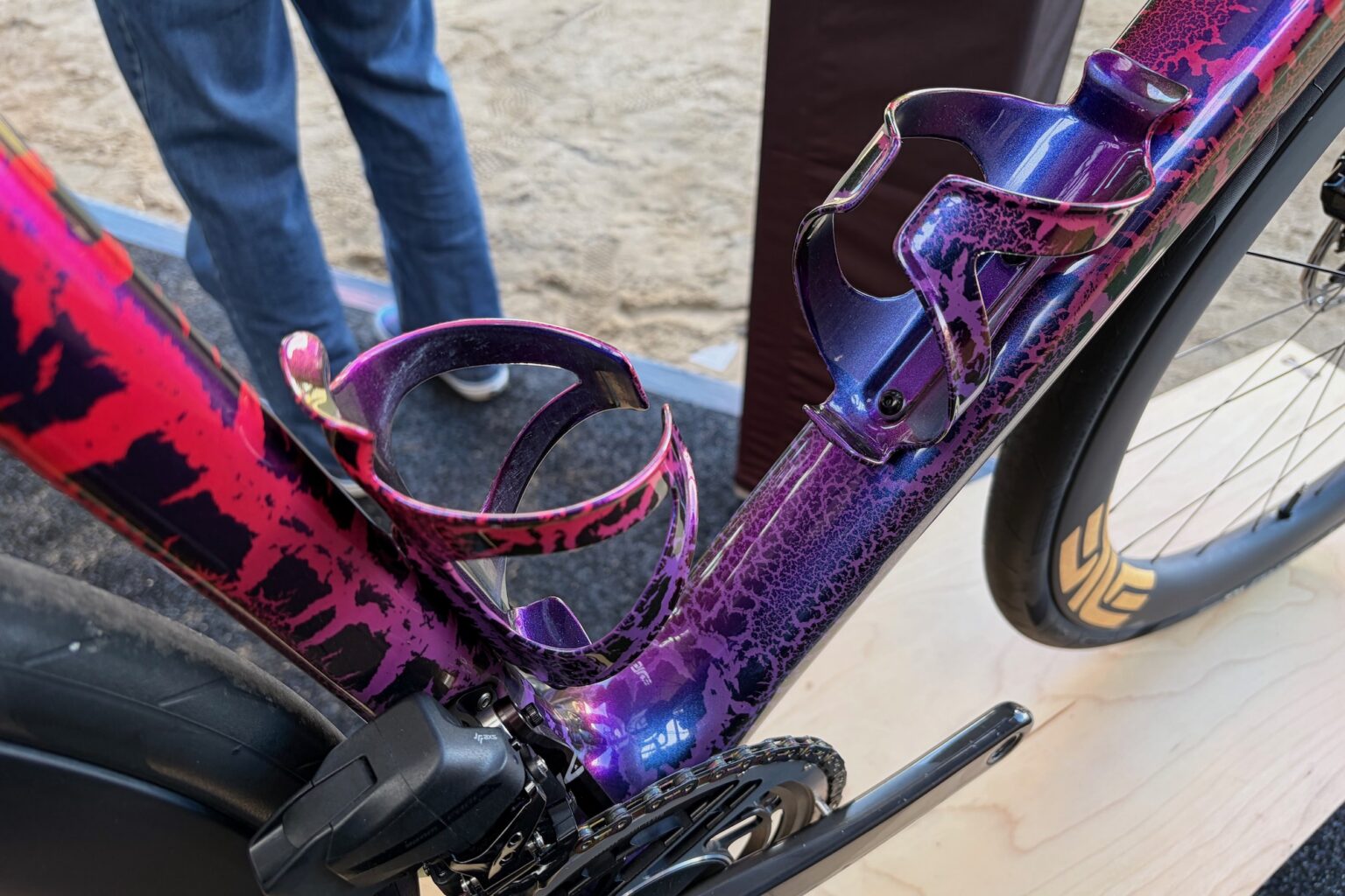 the custom painted Enve bike's bottle cages