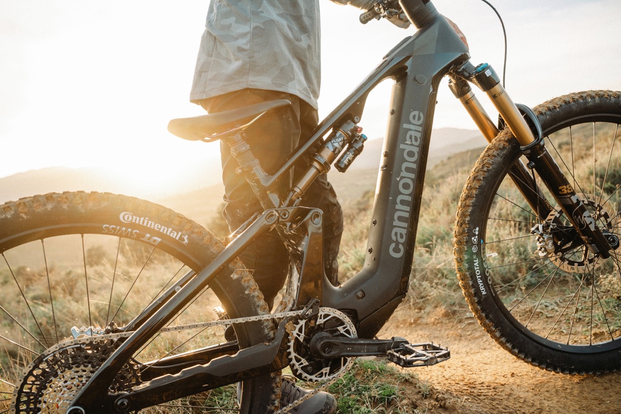a person standing next to the new Cannondale Moterra