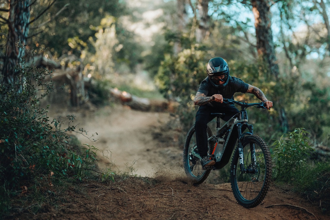 a person riding the Cannondale Moterra LT down a trail