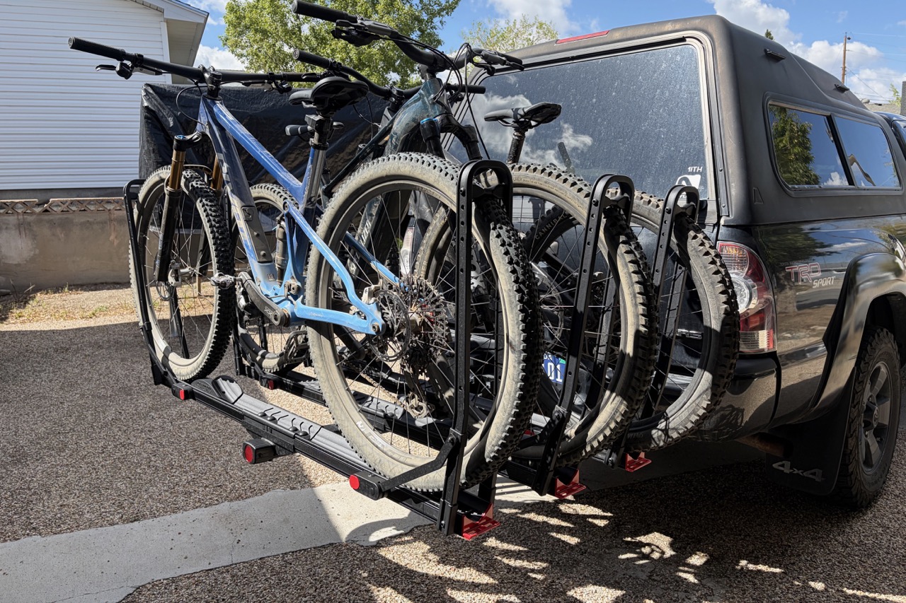 two e-bikes and one xc bike loaded on the Hollywood Crosstrack