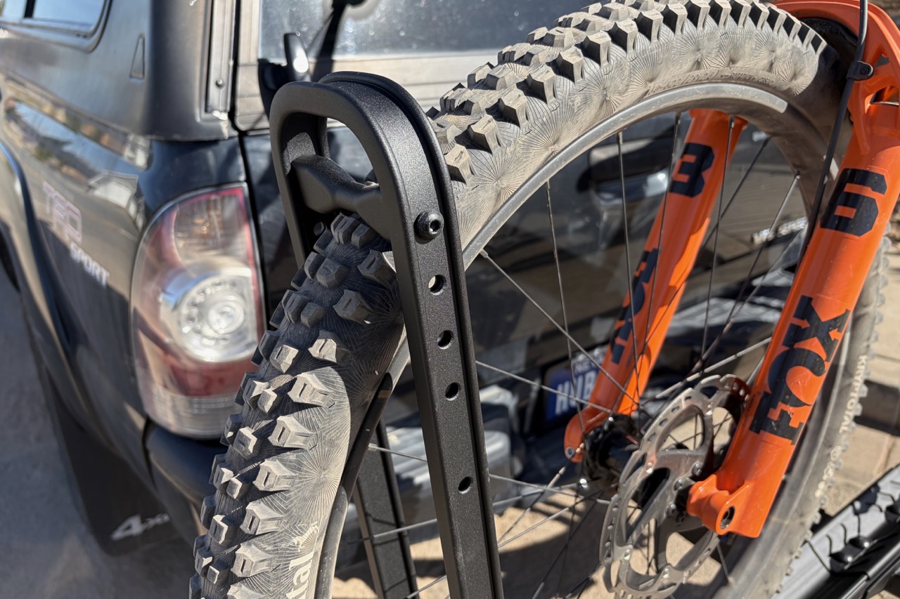 the holes on the CrossTrack's wheel arms to adjust for different wheel sizes