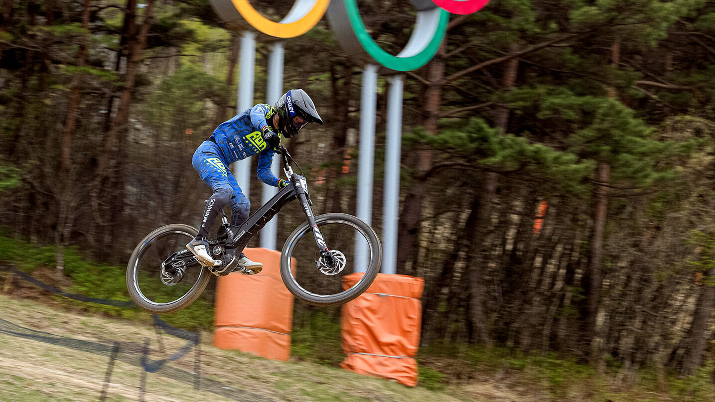 Reece Wilson owner, founder of AON Racing on all-new prototype Gamux belt-drive gearbox DH bike at Mona Yongpyong, South Korea DH World Cup