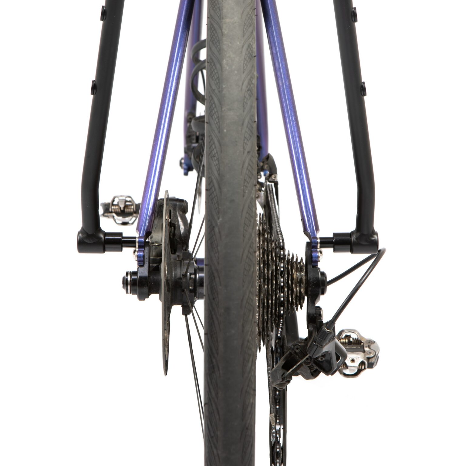 studio image of the direct mount adaptors being used to attach the restrap switch rack to a bike