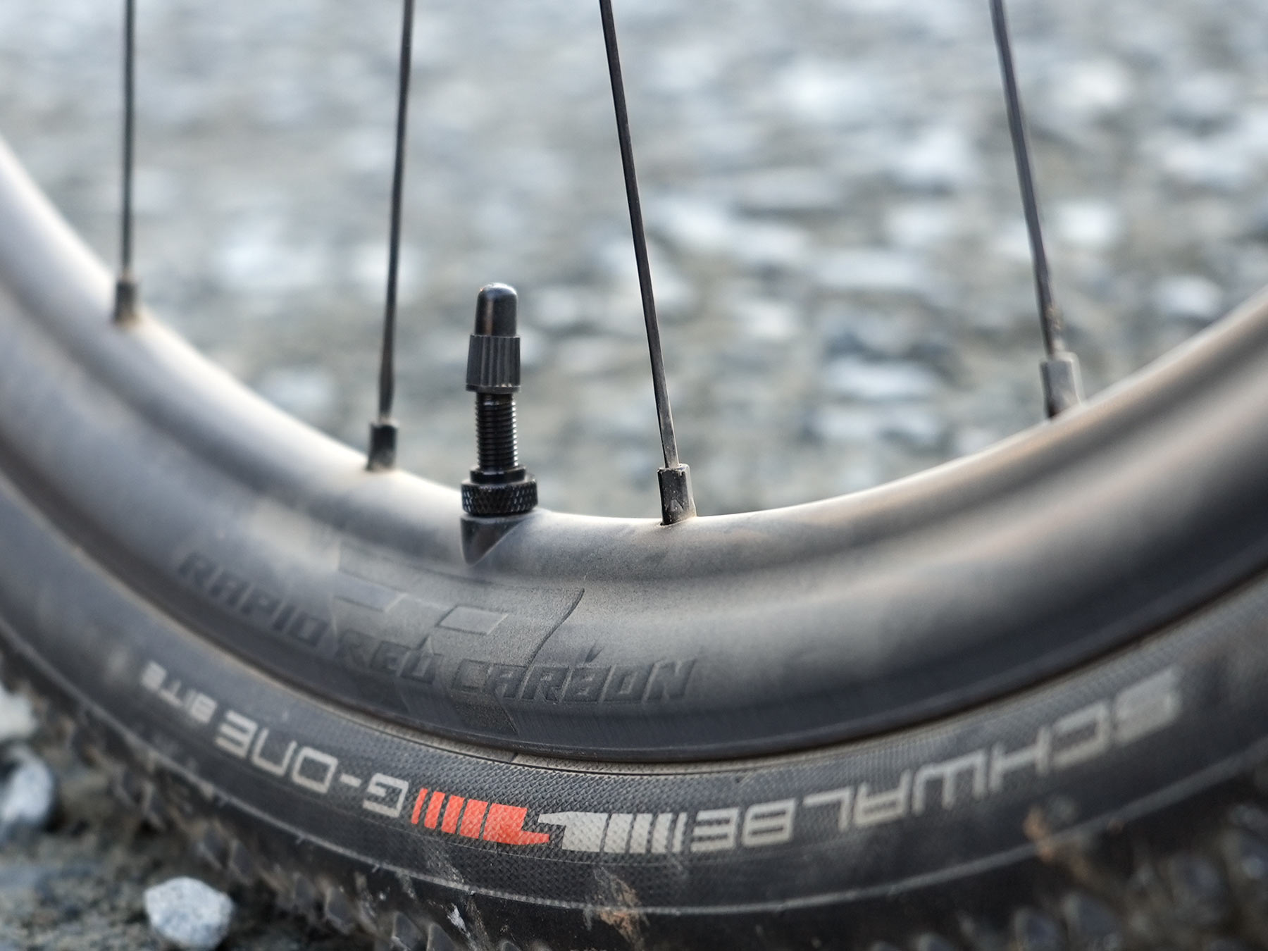 closeup details of fulcrum rapid red carbon gravel wheels.
