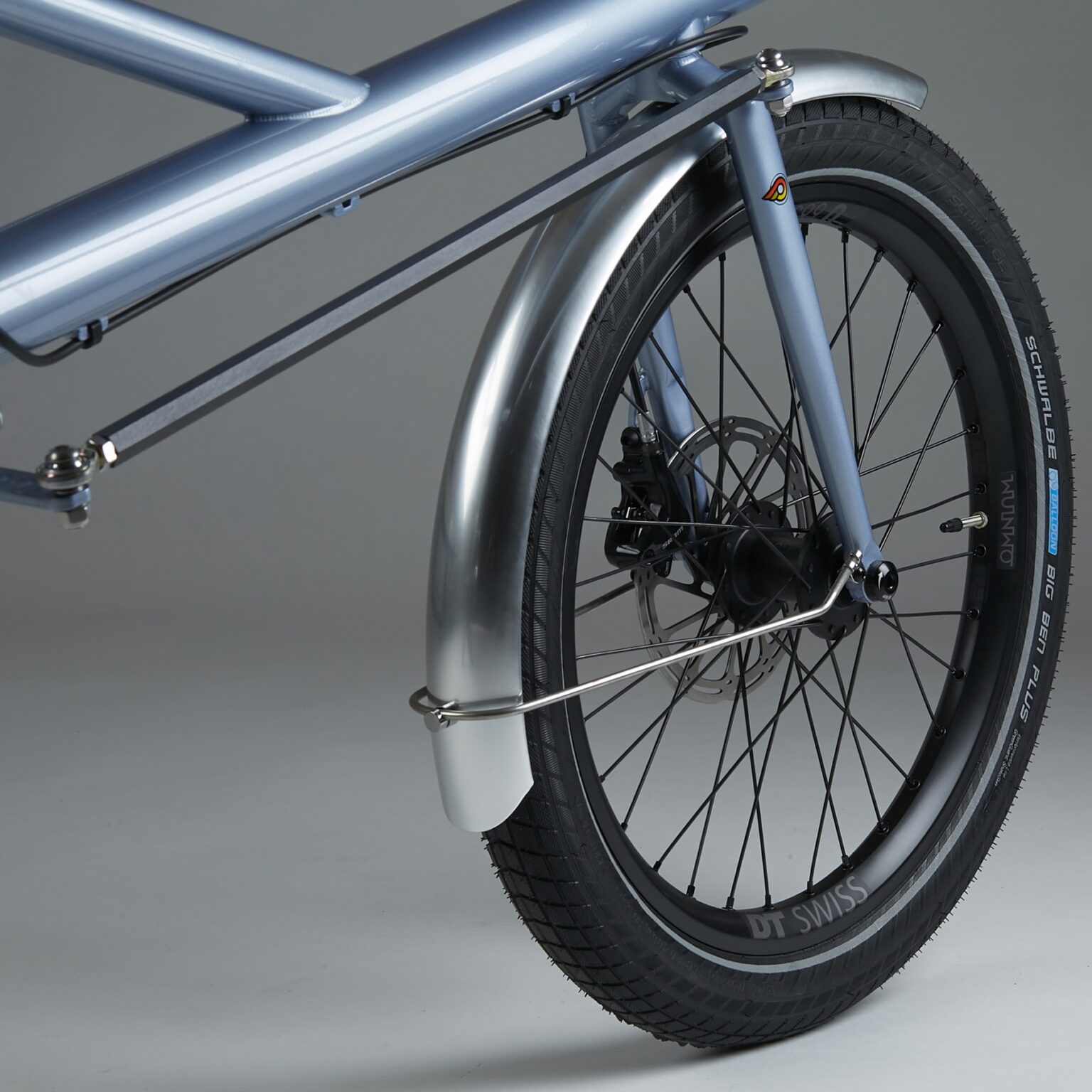 studio image of the front wheel and fender on the OMNIUM x Cinelli Supercargo bike