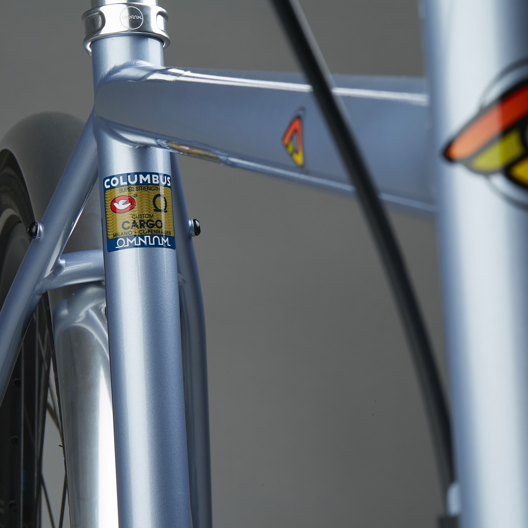 studio image of the frame and tubing logo on the OMNIUM x Cinelli Supercargo bike