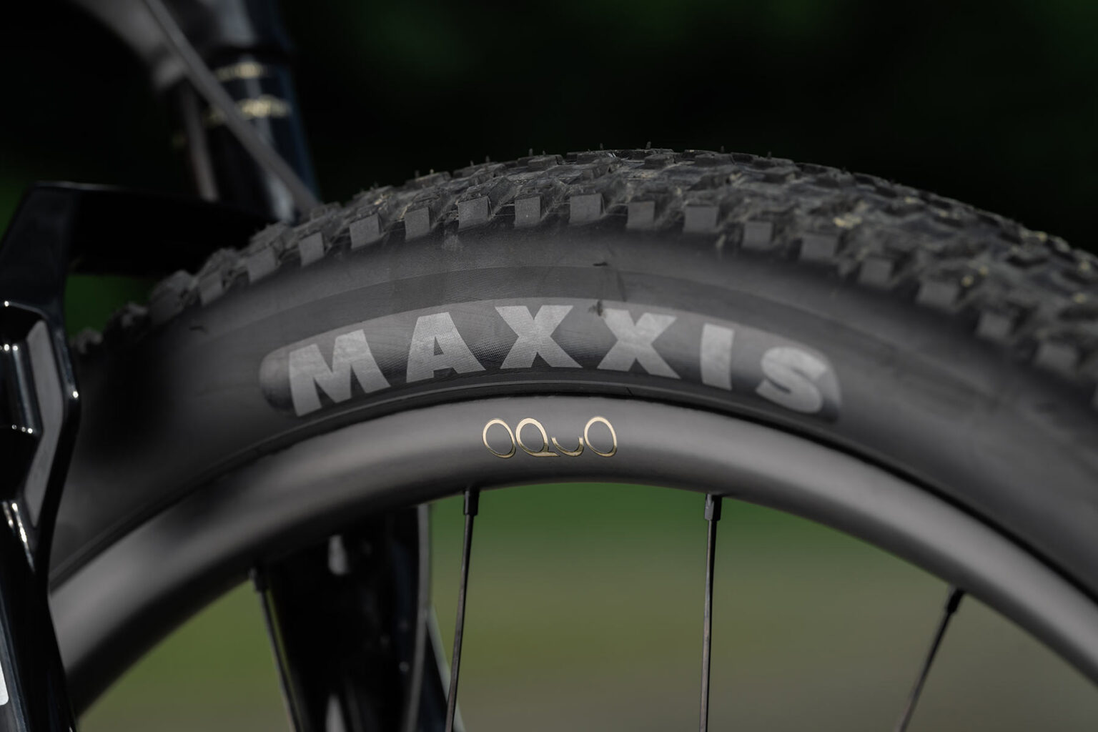 closeup details of 2027 orbea oiz ooqo wheel and maxxis tire.