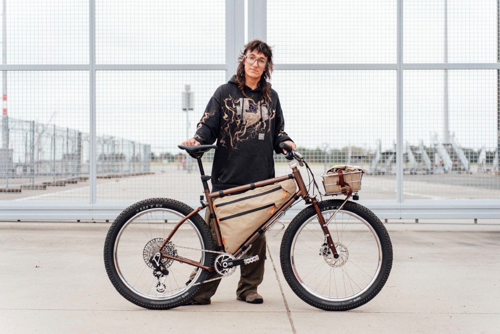 Bee from Gutter Bikes showing their Bespoked show bike at the 2025 show.