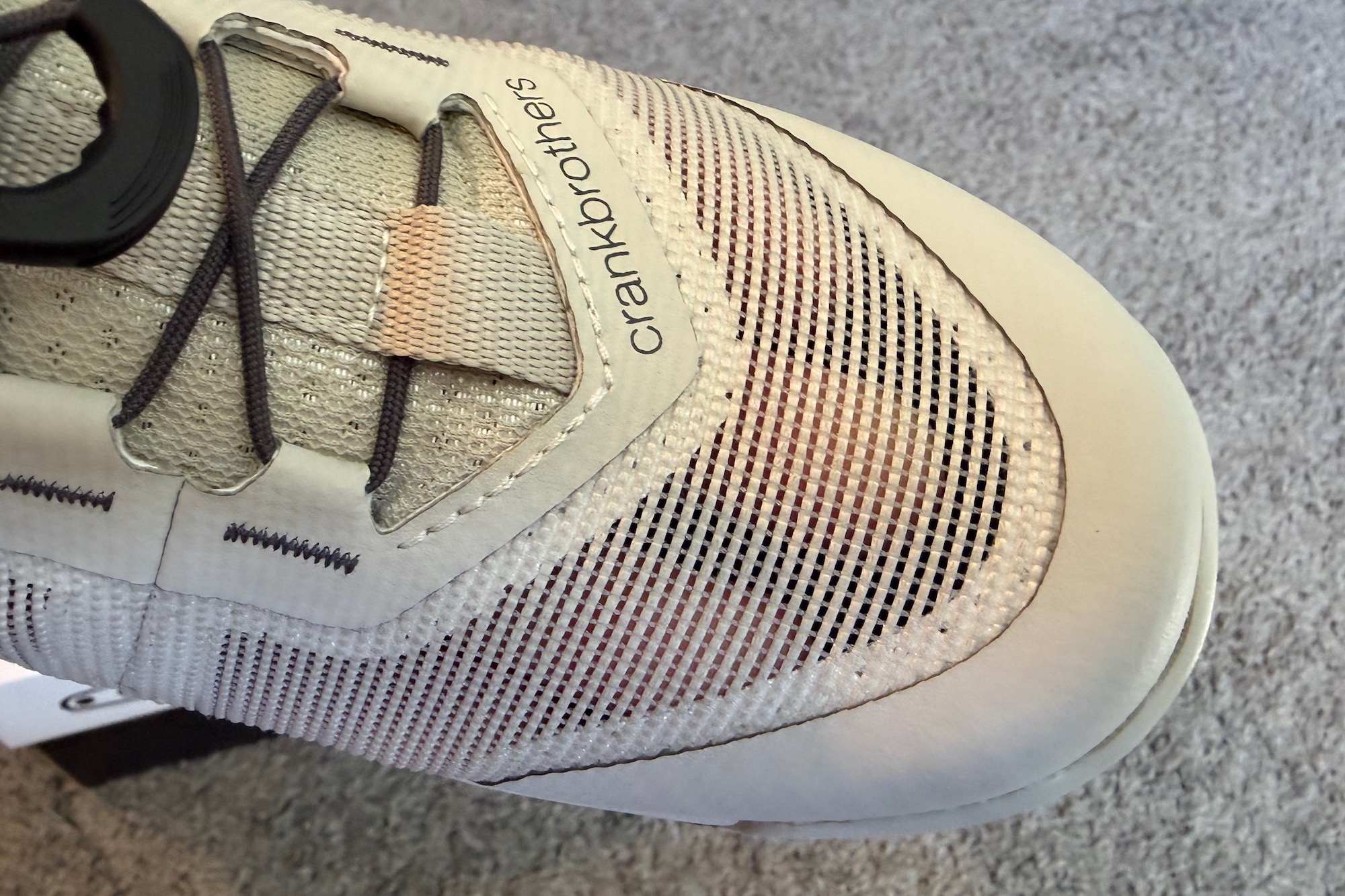 a close view of the mesh on the Crankbrothers Trail Vent shoes where you can see fingers underneath.