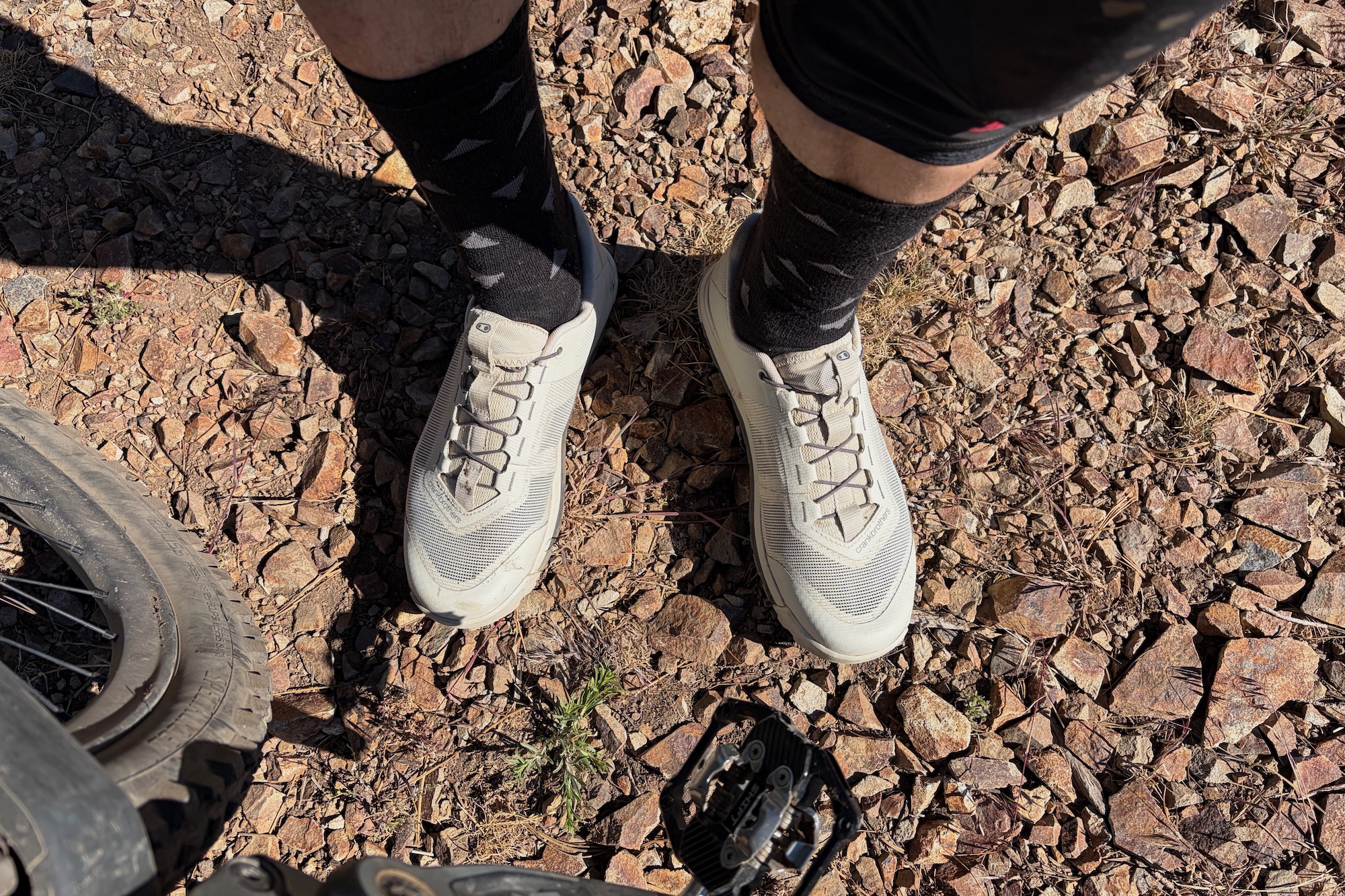 standing in the new Crankbrothers Mallet Trail vent shoes on a test ride.