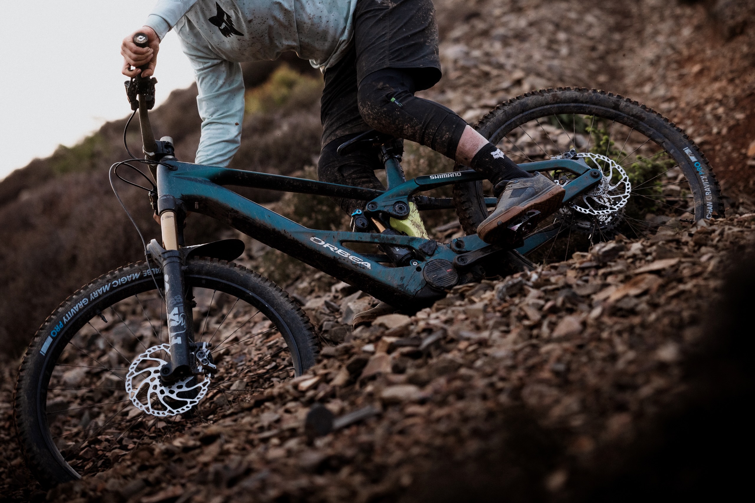 a rider going around a turn on the Orbea Wild LT