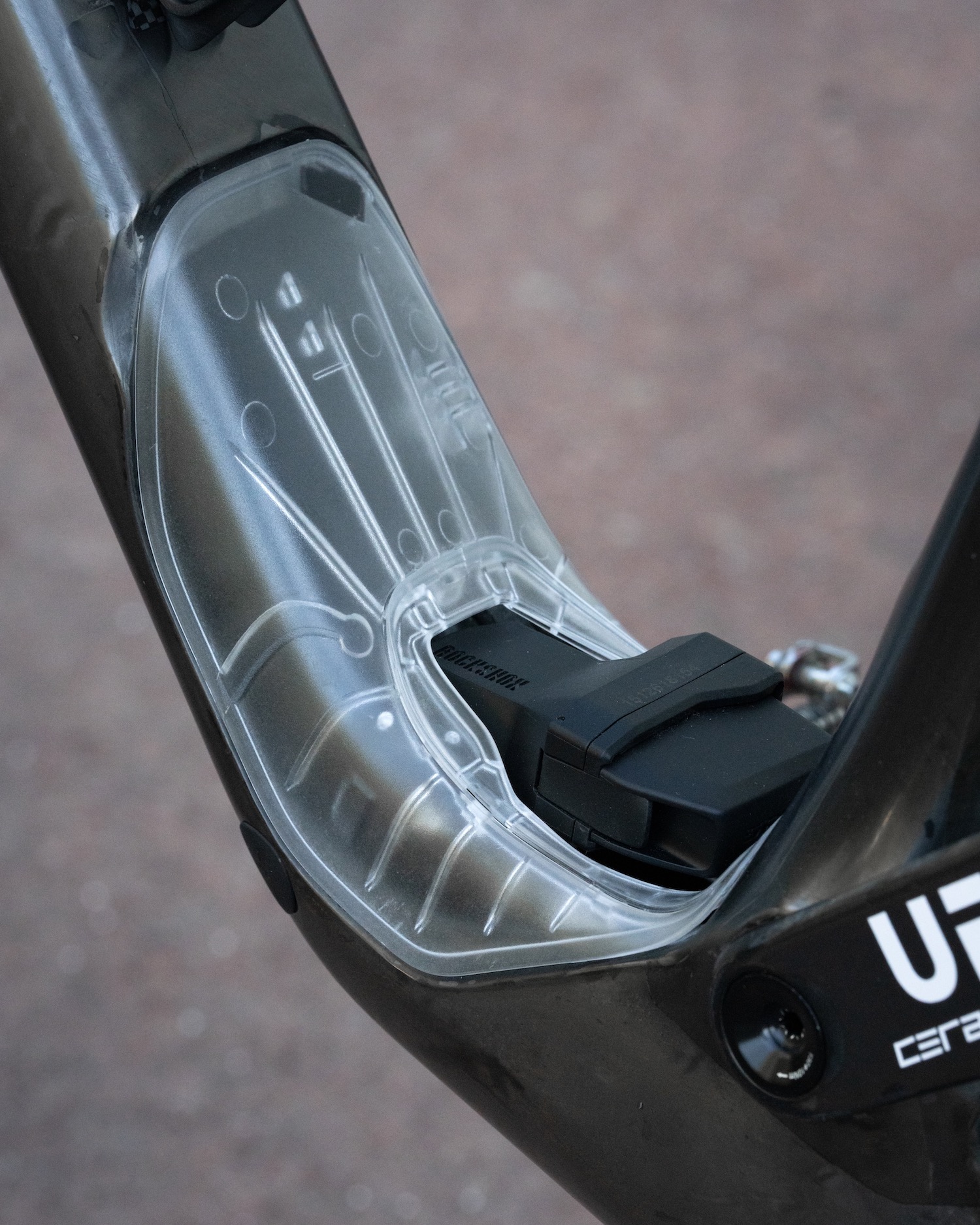 the transparent shock cover on Dangerholm's Scott Saprk RC custom build.