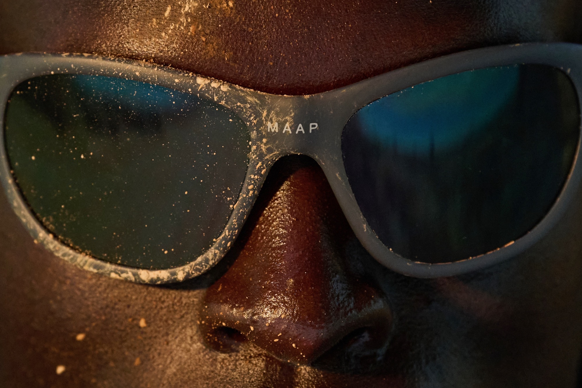 close-up picture of a person wearing the MAAP Fuse sunglasses