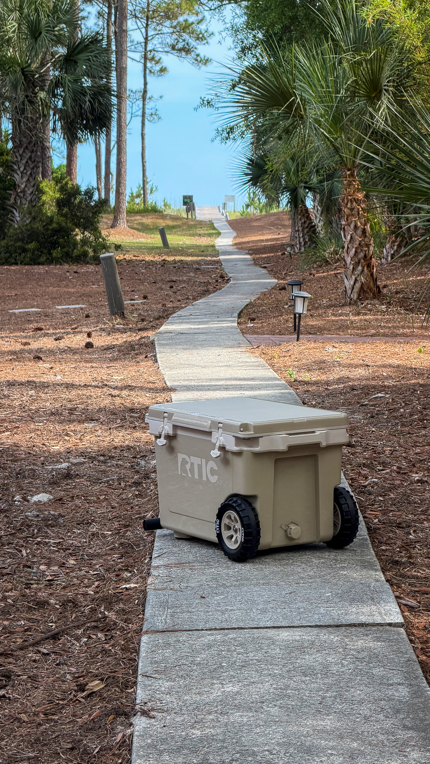 RTIC 54 qt wheeled cooler on beach path