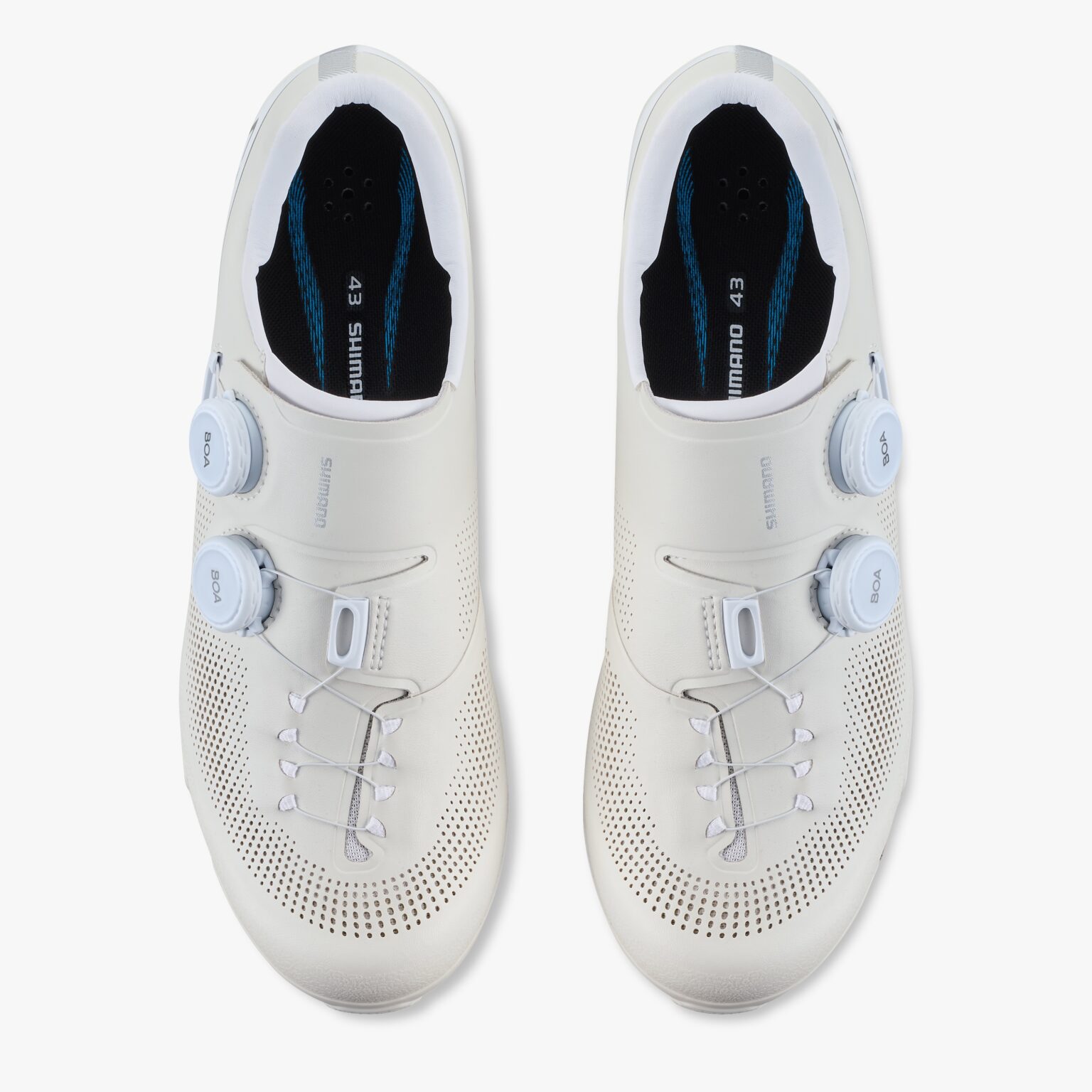 studio image of the pair of Shimano RX710 gravel shoes in white, viewed from above