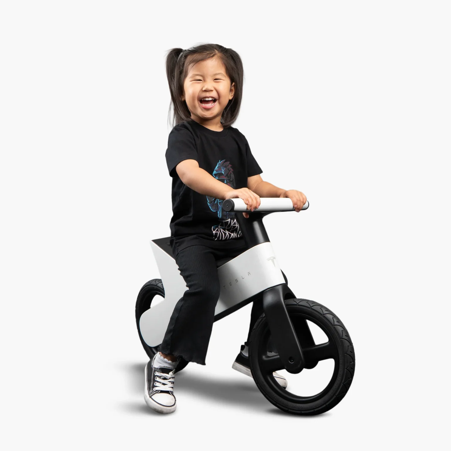 Tesla balance bike with child