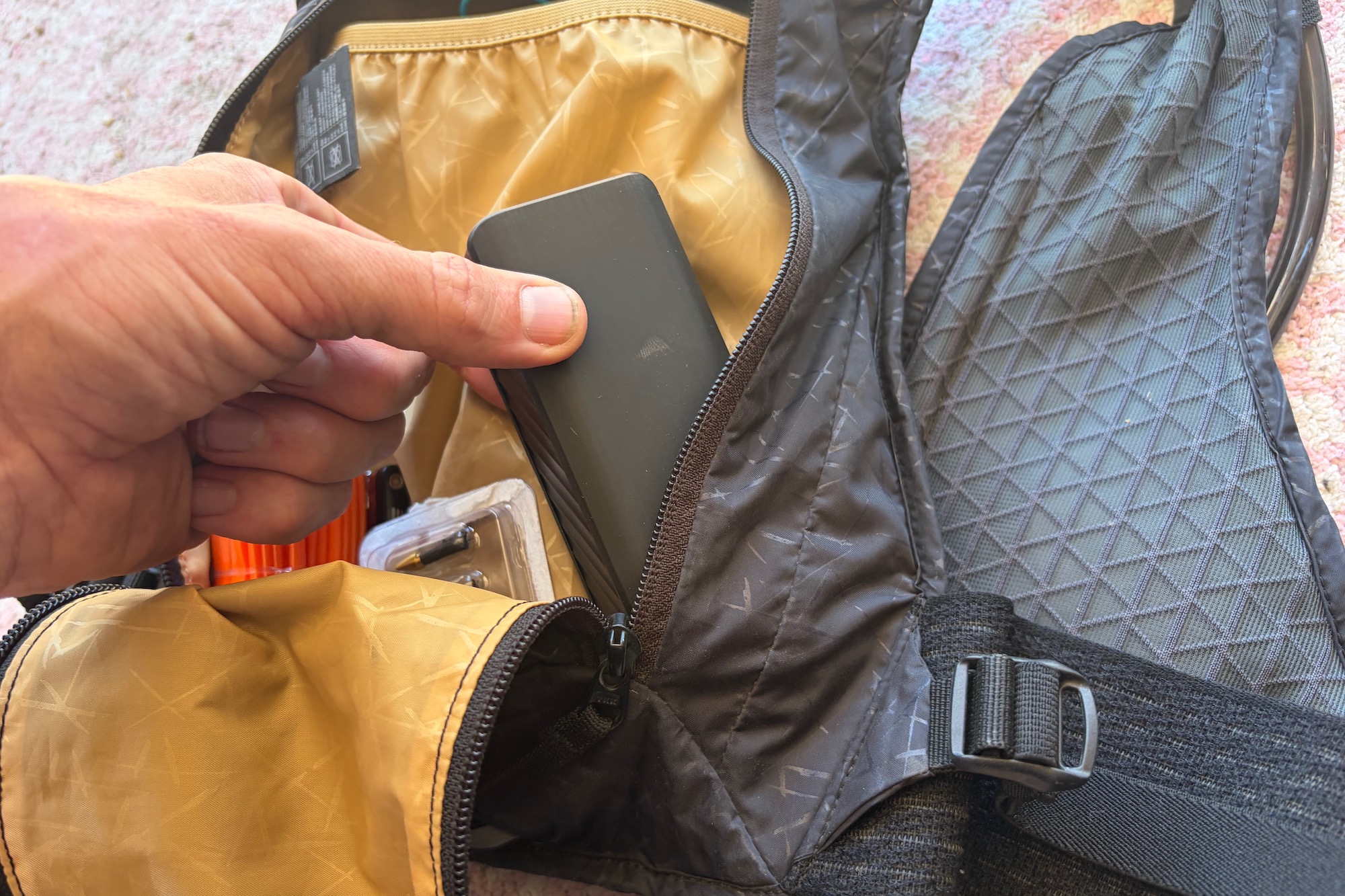 the cycplus A3 Mini inside of my hydration vest.