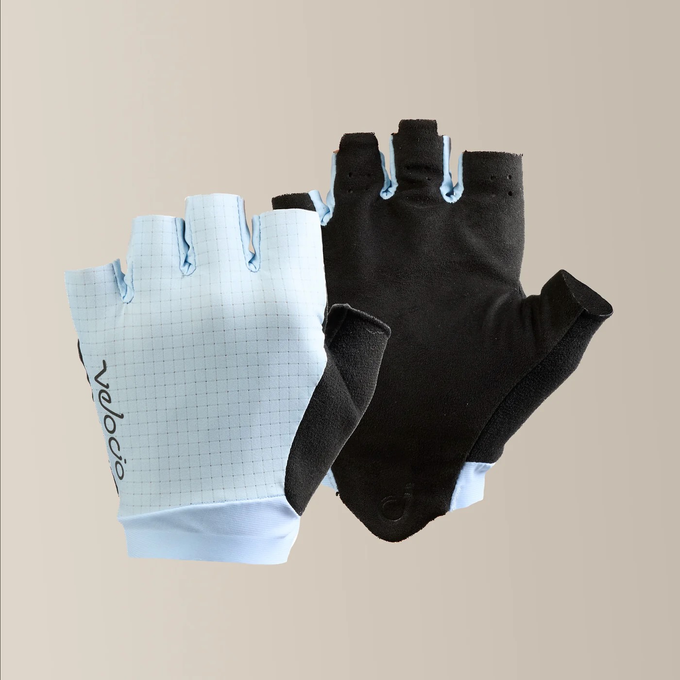 studio image of the Velocio LUXE Ultralight gloves in Tourmaline