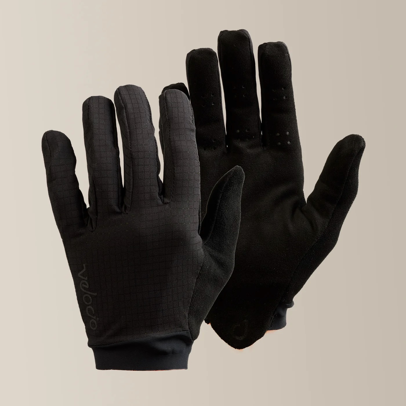 studio image of the Velocio TRAIL Ultralight gloves in Black