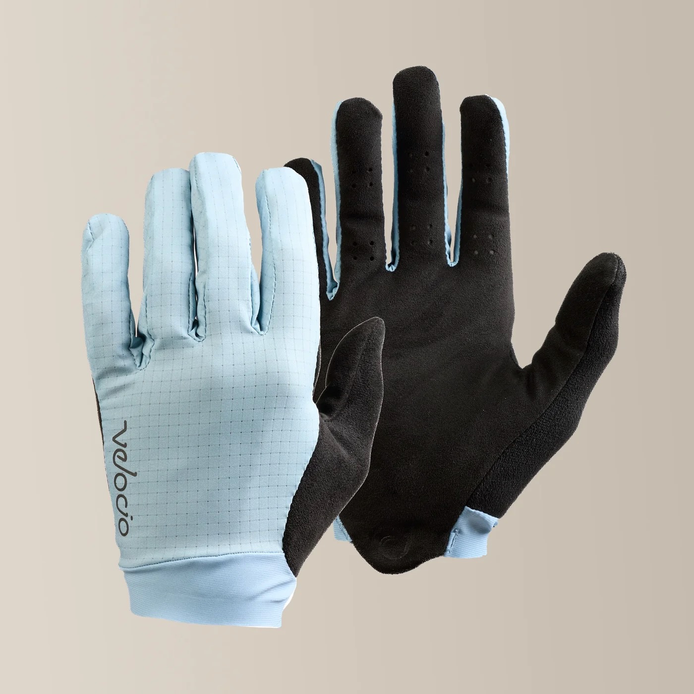studio image of the Velocio TRAIL Ultralight gloves in Tourmaline