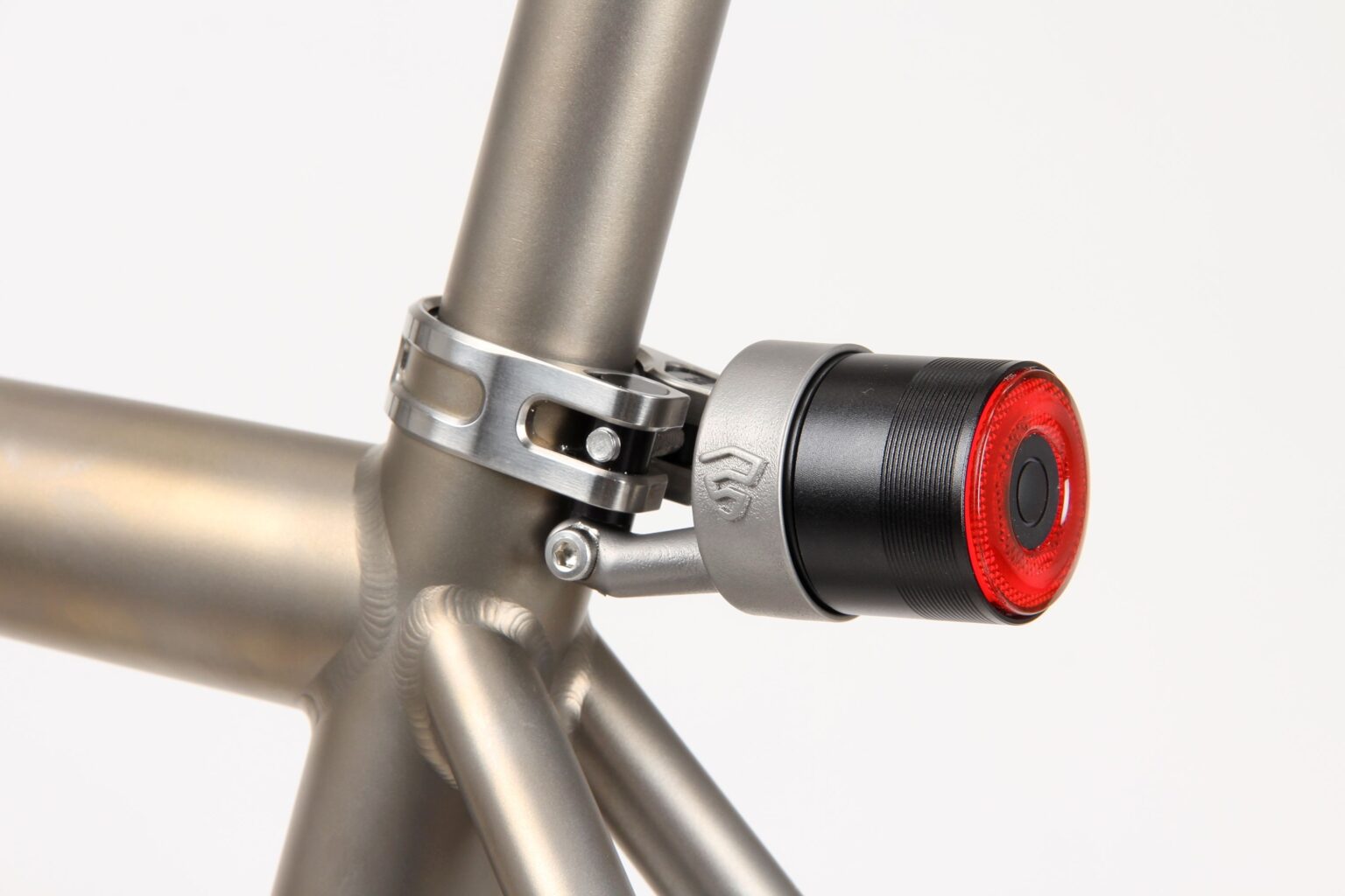 studio image of the Firefly Radar Mount on a bike with  a small light attached.