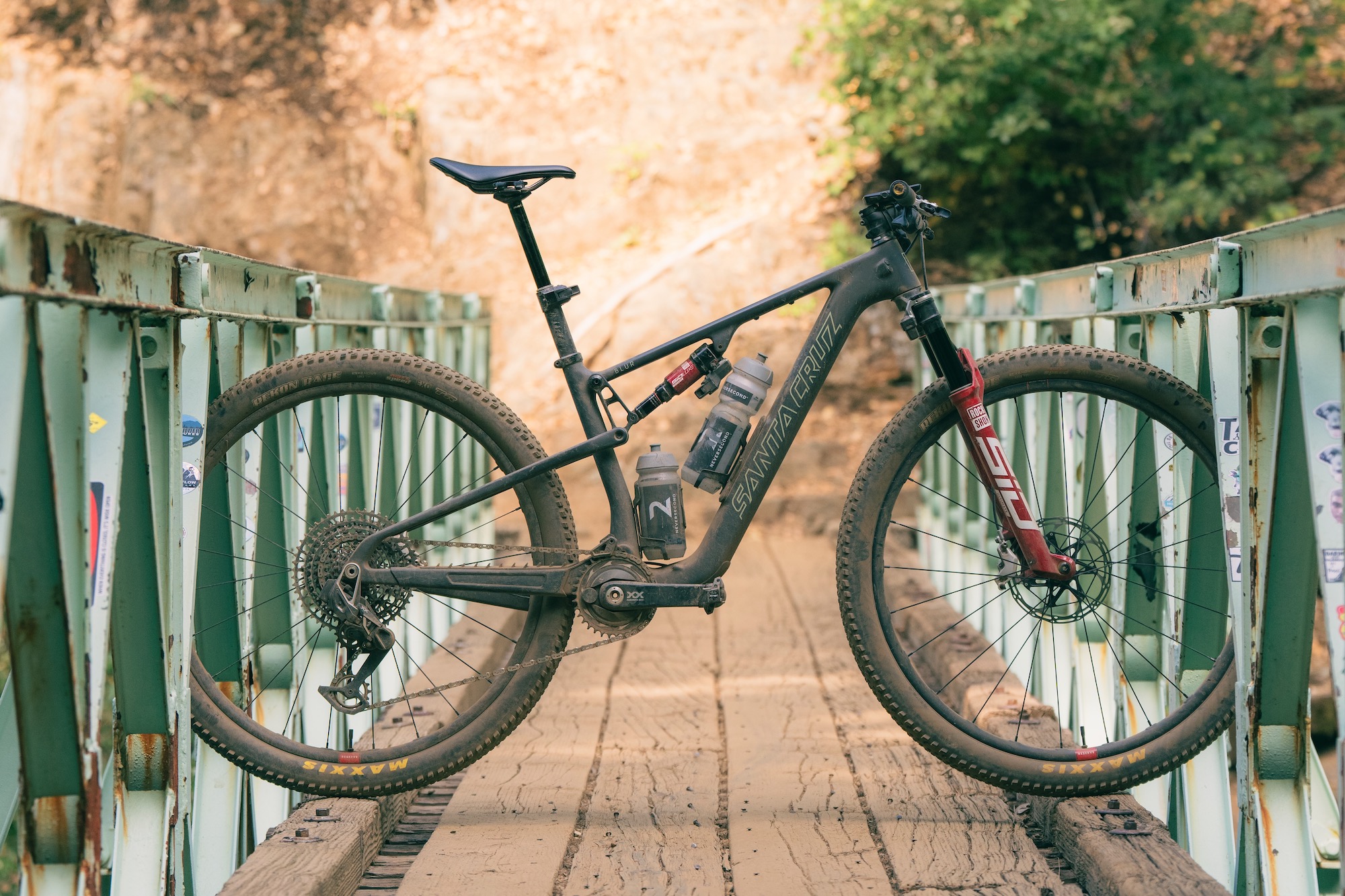profile of Ruth Holcomb's Santa Cruz Blur 5 on a bridge at Downieville