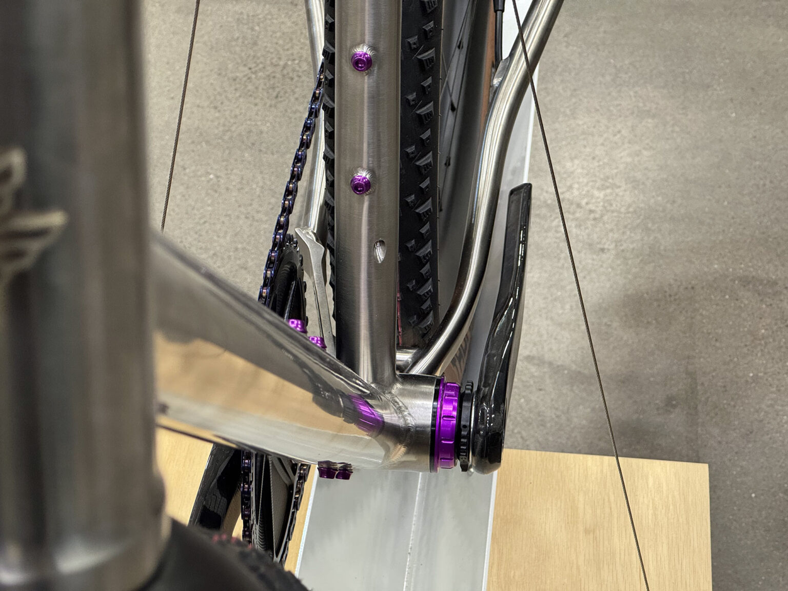 tire clearance closeup on donkey label titanium monster gravel bike.