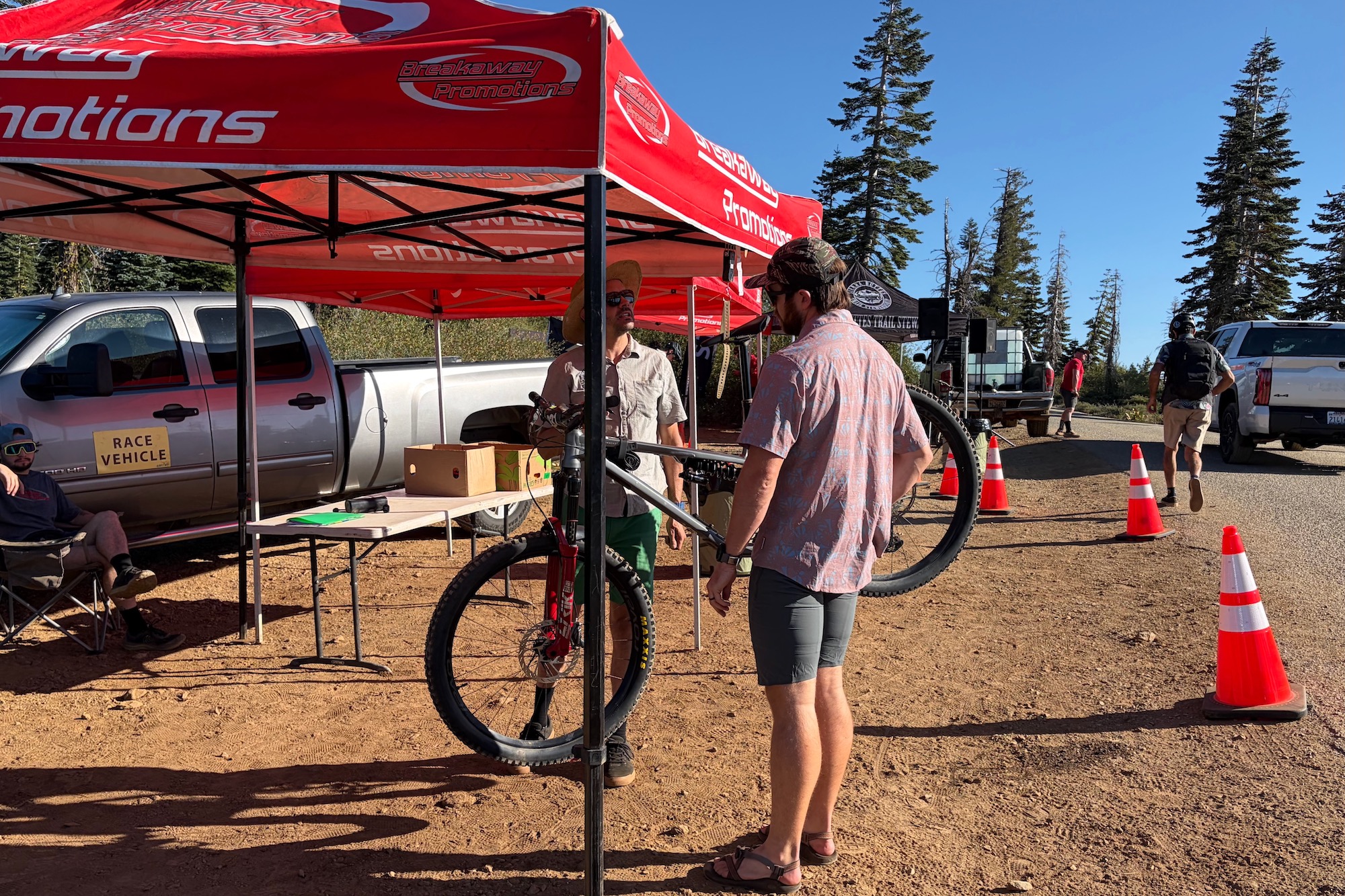 weighing in a bike at the top of packer saddle before the DH day.
