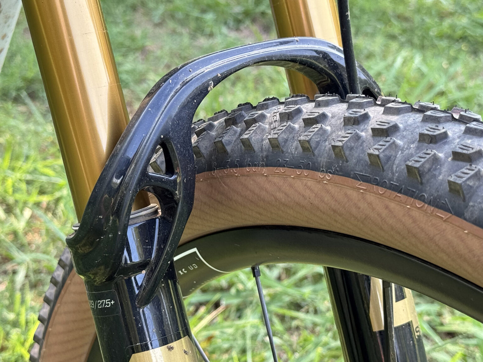 closeup details on fox 34 sl mountain bike fork arch.
