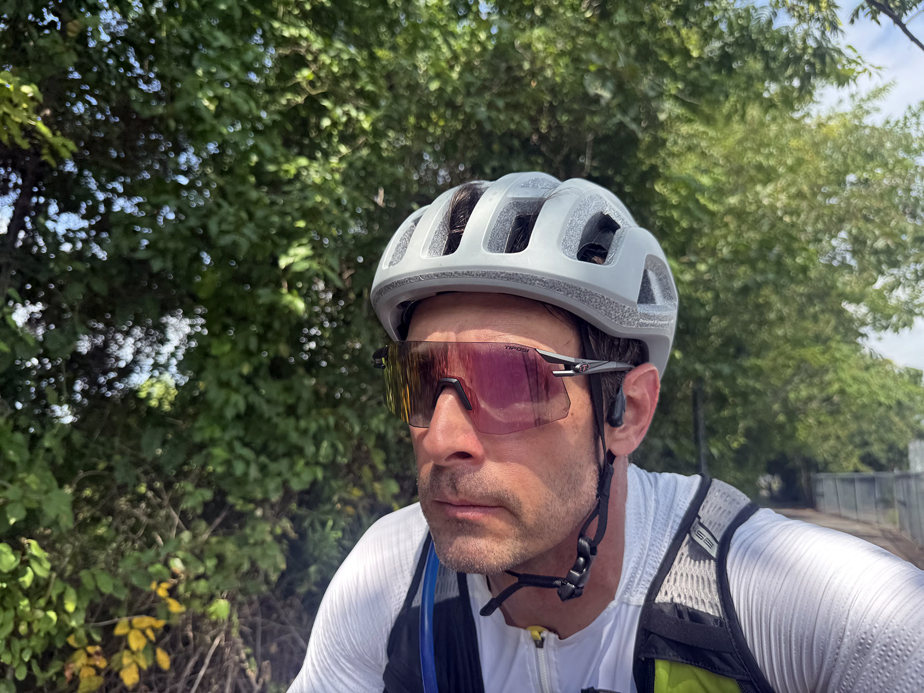 cyclist wearing tifosi moab xc sunglasses.