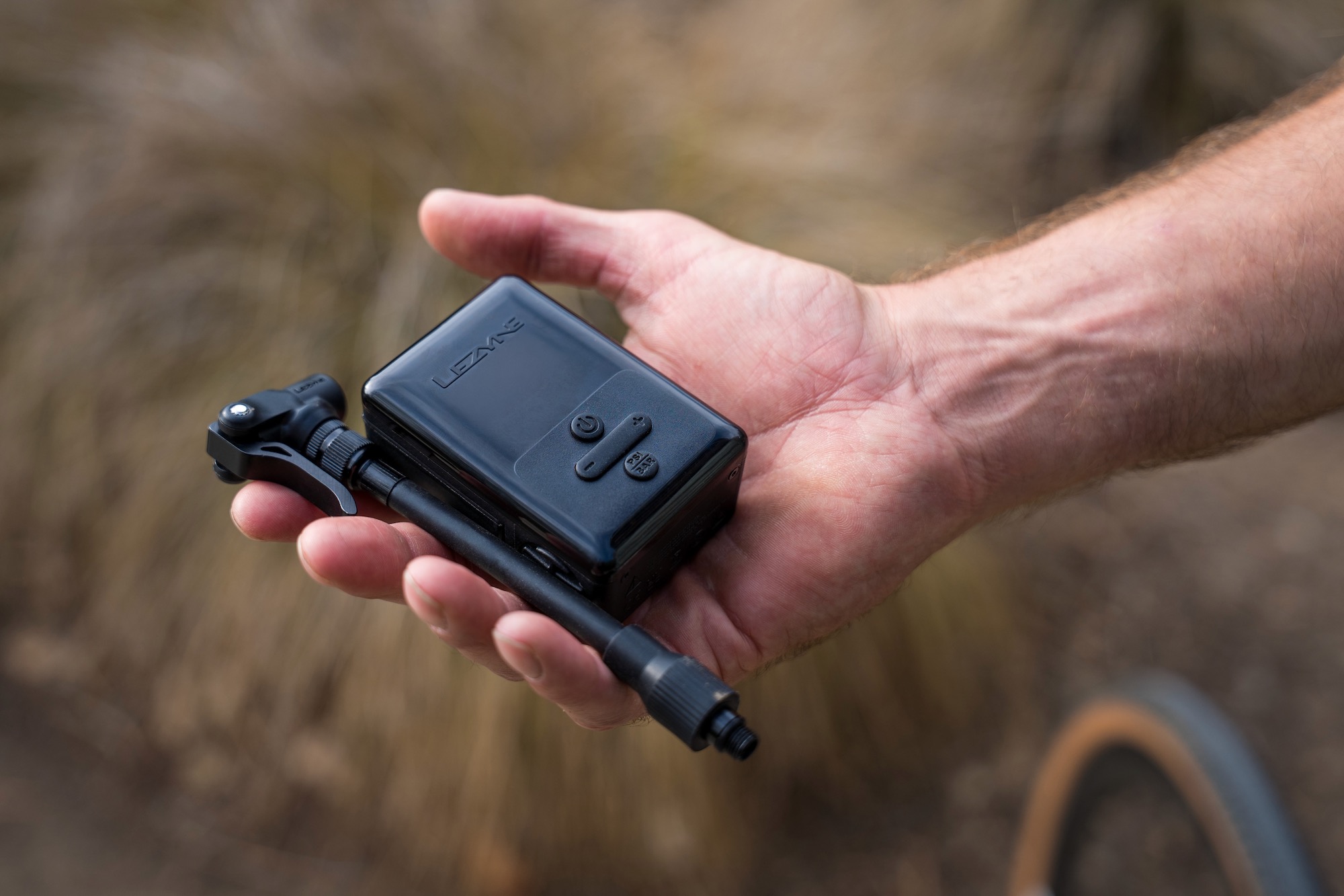 a person holding the Lezyne E-Drive