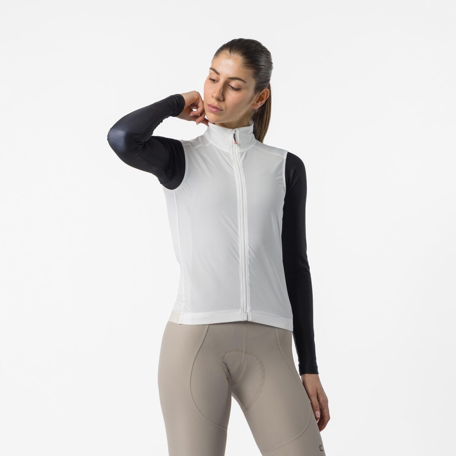 studio image of a woman wearing the Espresso 2 Vest