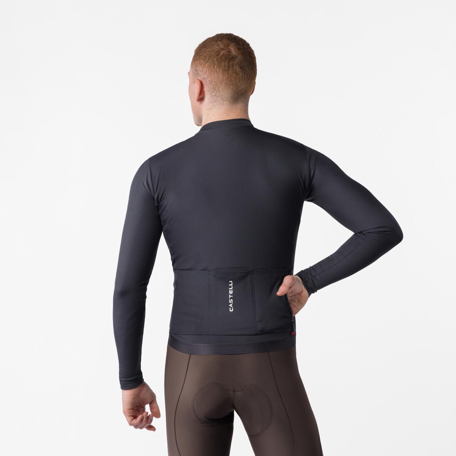 studio image of a man wearing the Espresso 2 LS Jersey viewed from the back