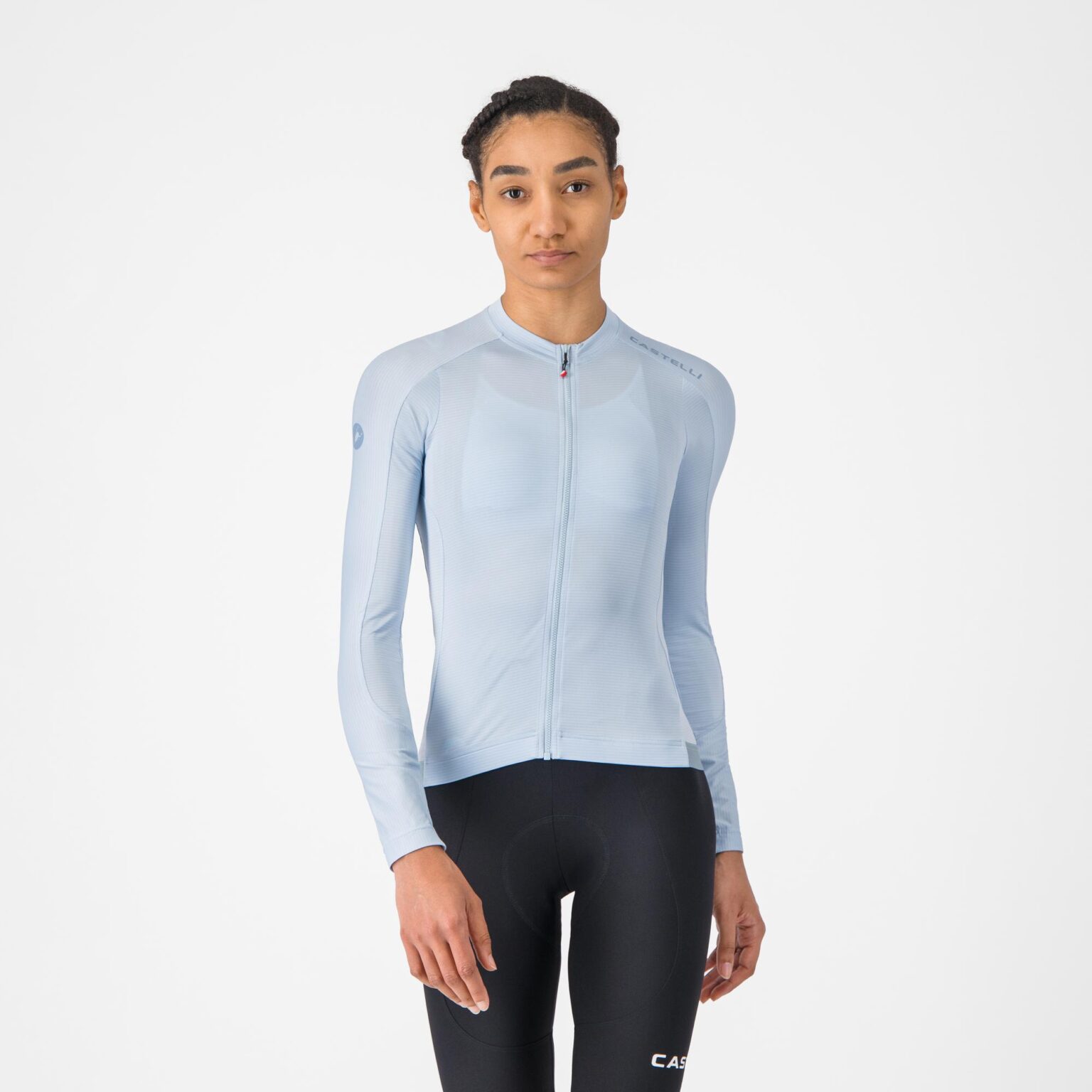 studio image of a woman wearing the Espresso 2 LS Jersey viewed from the back