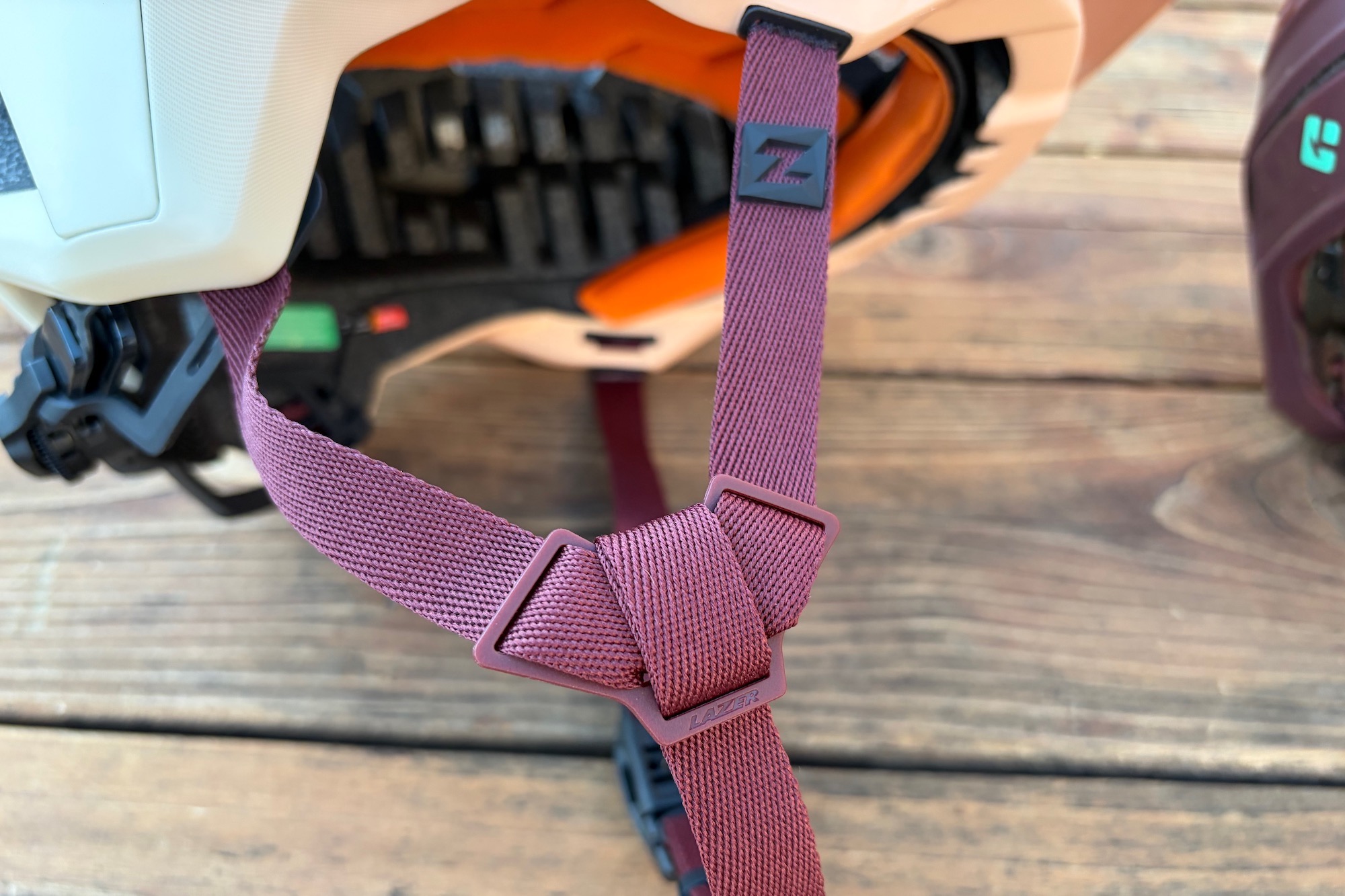 the adjustable plastic slider on the ear straps of the 2027 Impala KinetiCore helmet