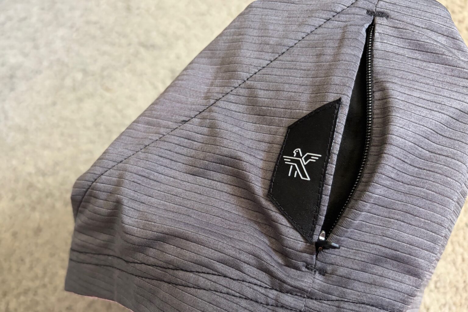 the hidden pocket on the KETL Wayward Tee
