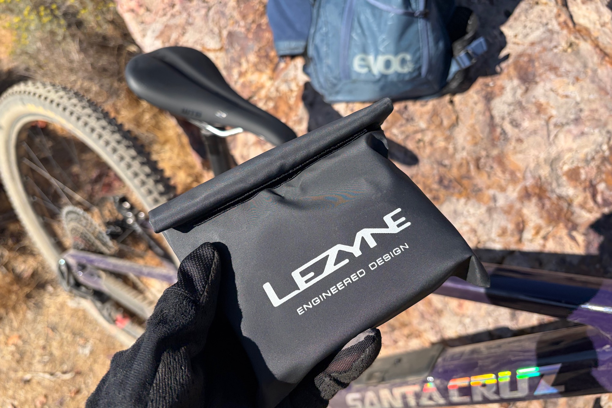 holding the Lezyne E-Drive in its storage bag.