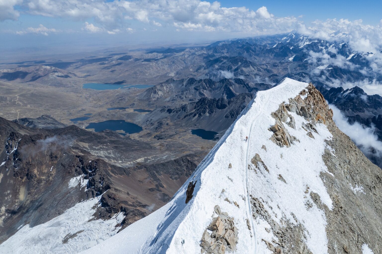 Killian Bron riding from the top of a very high mountain.