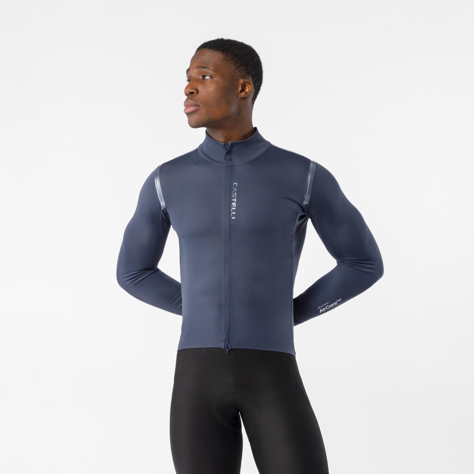 studio image of a man standing wearing the new Castelli Perfetto 4 jacket viewed from the front