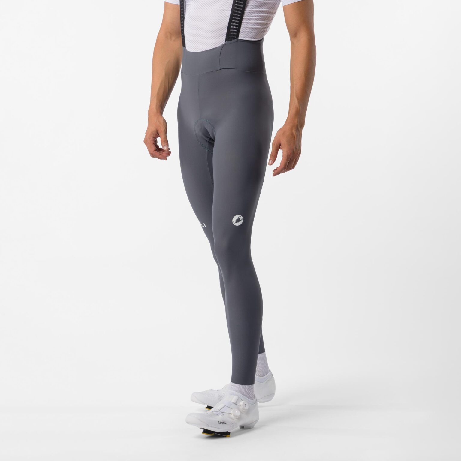 studio image of a man wearing the Espresso TRNSTN bibtights