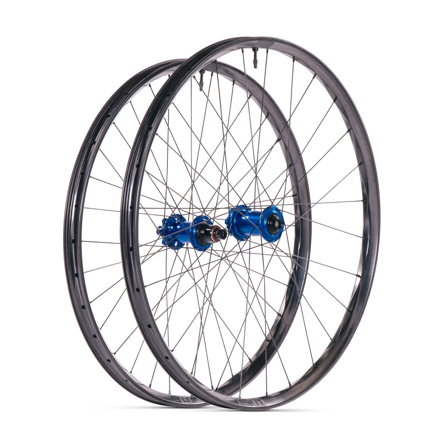 studio image of a complete We Are One Triad Mullet wheelset built with Wolf Tooth hubs.