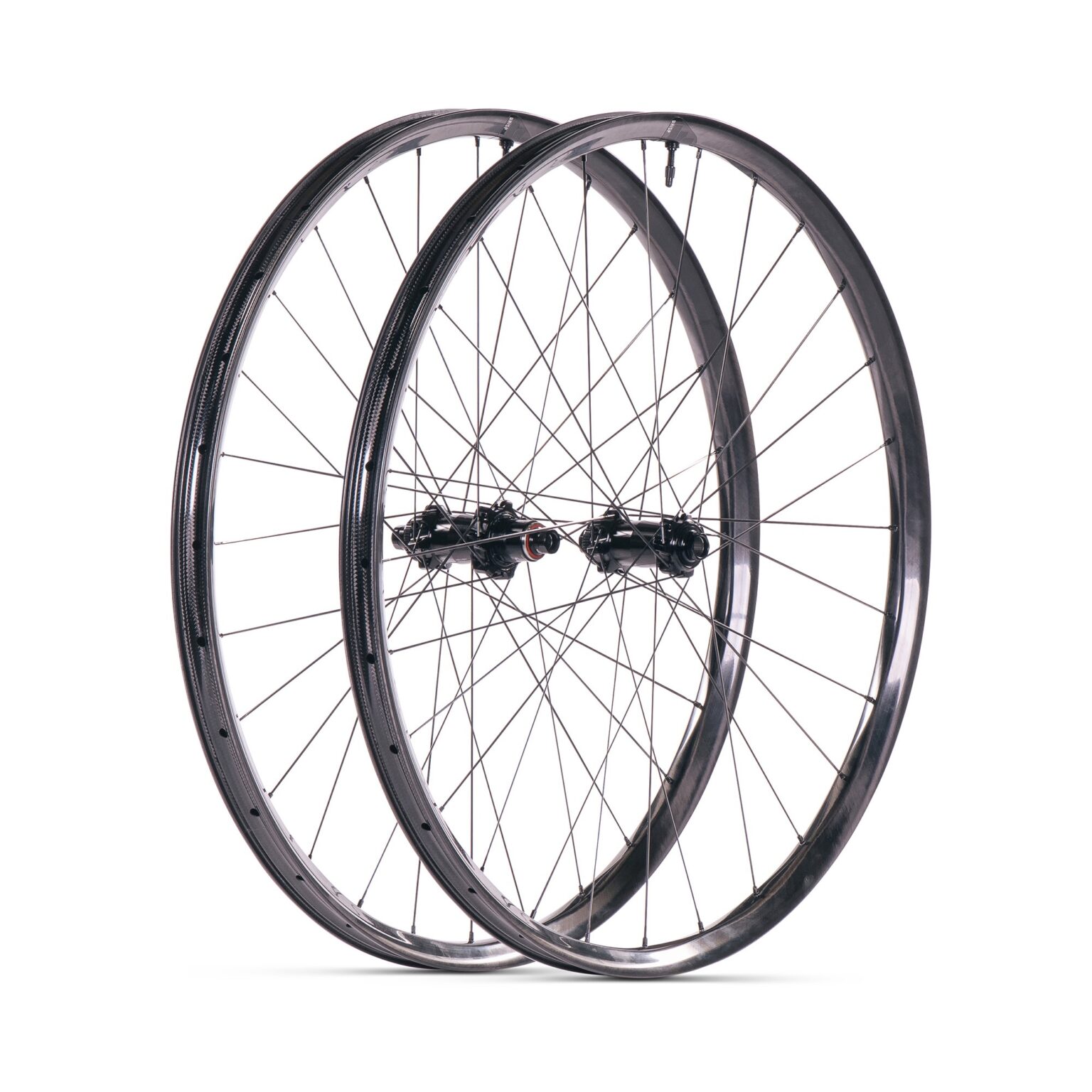 studio image of a complete We Are One Whisp wheelset built with Wolf Tooth hubs.
