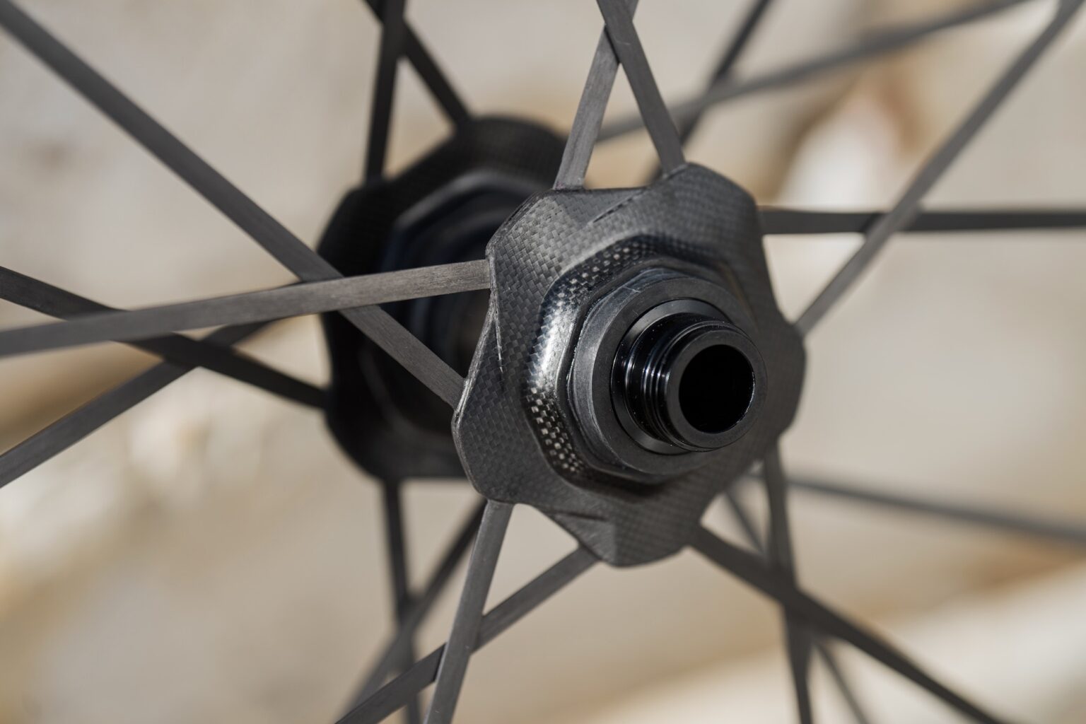 a close view of the integrated front hub and spoke construction on the CADEX Max XC WheelSystem