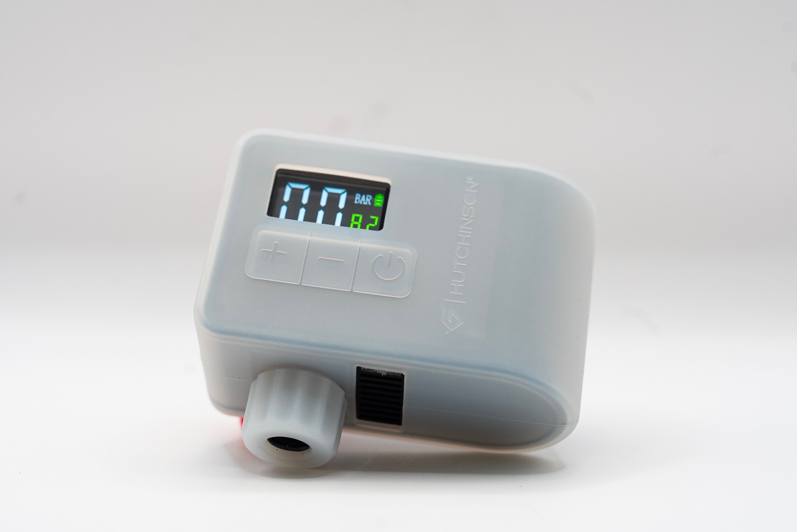 studio image of the Hutchinson FlashAir inflator with the grey silicone adapter on it.