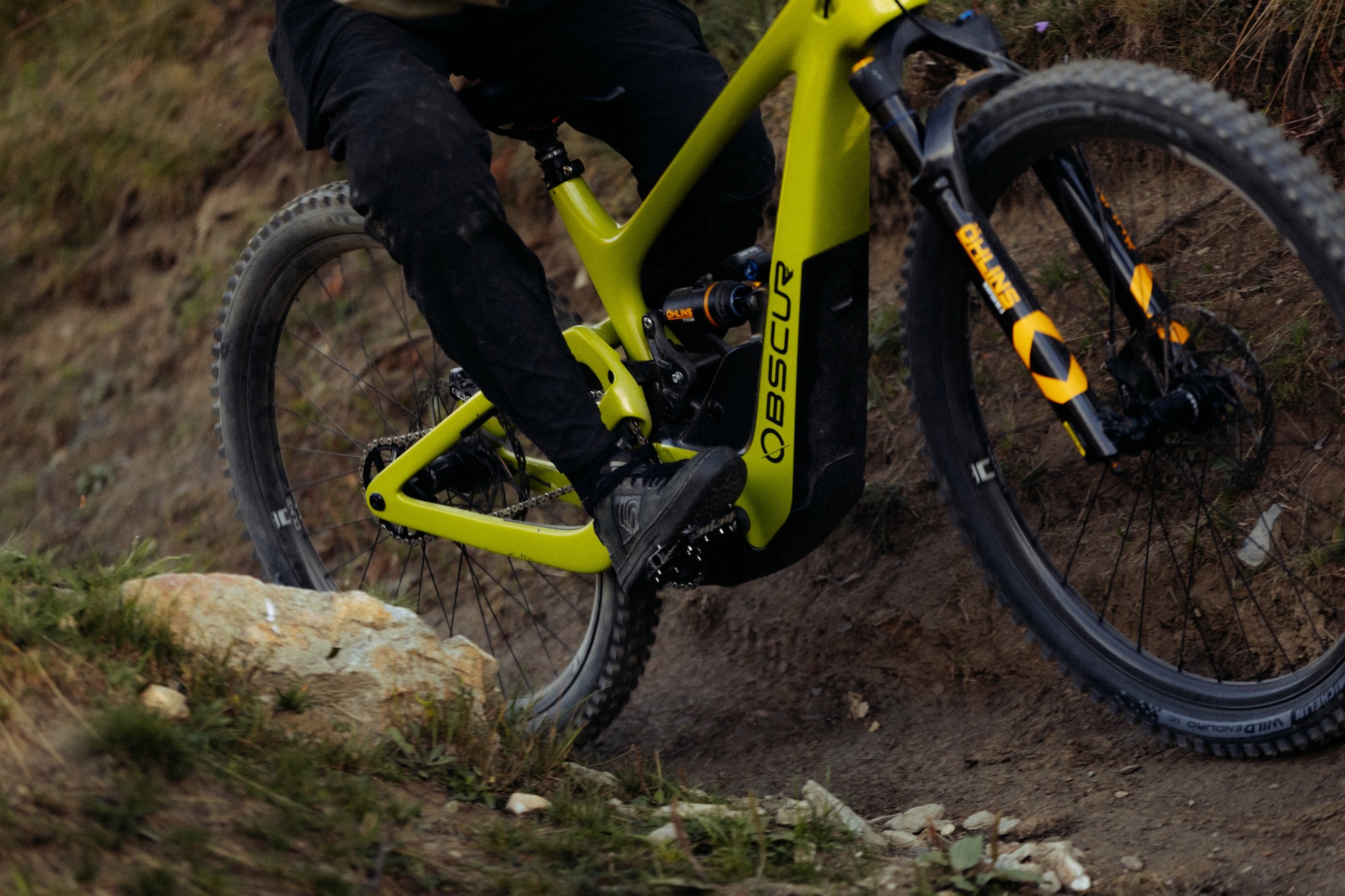close view of a person riding the Obscur Enyx eMTB